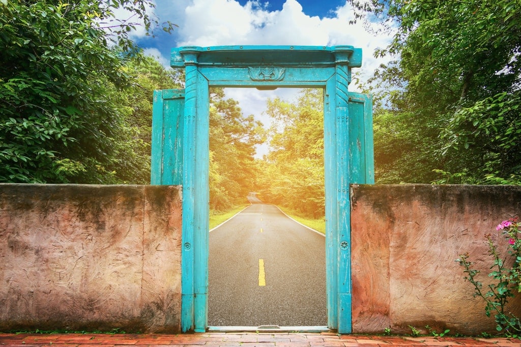 door looking out onto bright road