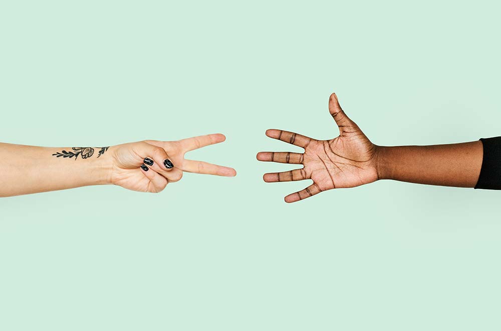 Hand holding an object.